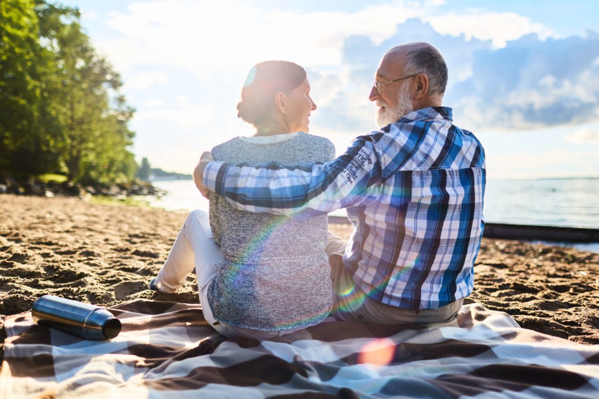 retired couple on a beach